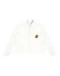 Off-white boxy button-up shirt, front view; a small mango with a blue SP diamond sits on the chest pocket.
