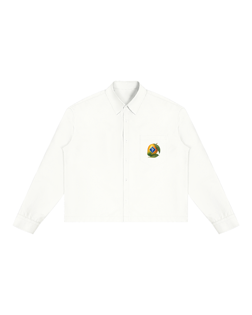 Off-white boxy button-up shirt, front view; a small mango with a blue SP diamond sits on the chest pocket.